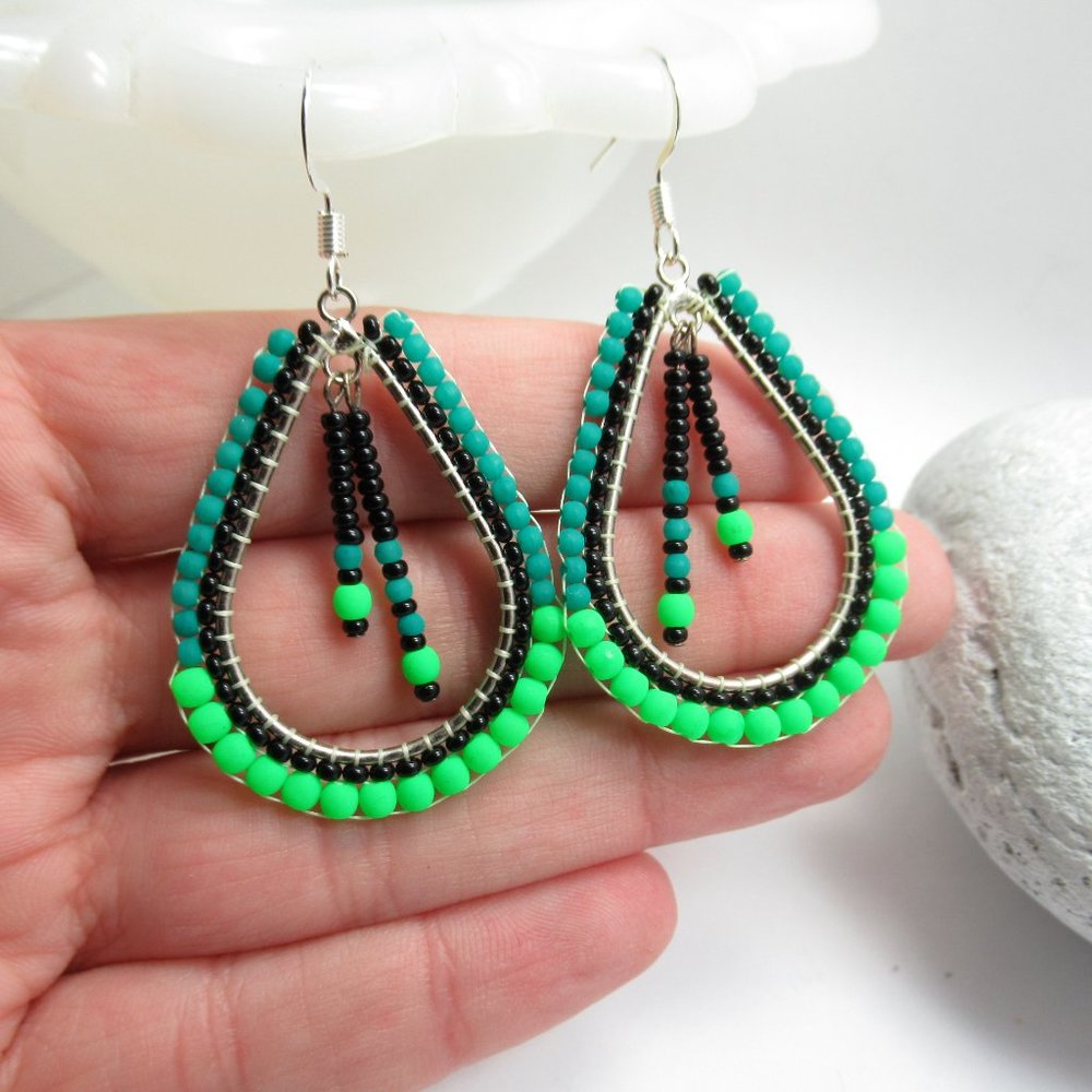 Teal and green neon hand stitched earrings